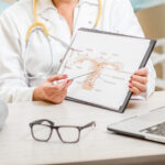 Doctor explaining uterus diagram